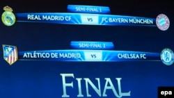 Switzerland -- The match fixtures are shown on an electronic panel following the draw of the semi-finals of UEFA Champions League 2013/14 at the UEFA Headquarters in Nyon, April 11, 2014