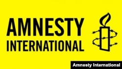 Amnesty International ұйымының логотипі (Көрнекі сурет).